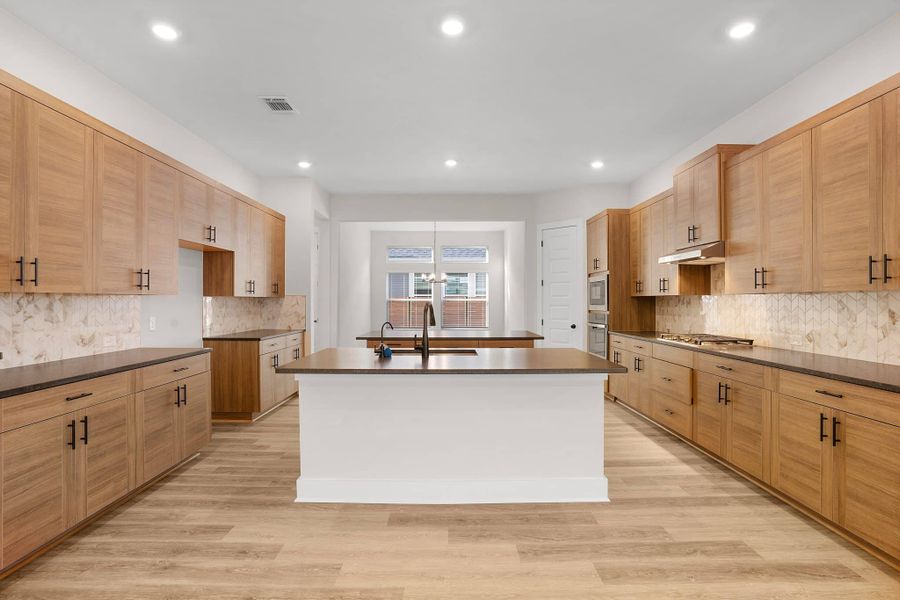Representative furnished interior of a home built from the Cornell – 60′ Lot by Chesmar Homes in Lakes of Cane Island, Katy (Image 4).