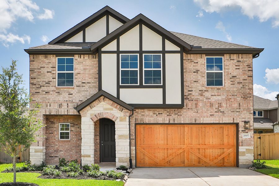 Representative exterior photo of a completed home built from the Enclave Series - Maui by DRB Homes in Dauer Ranch, New Braunfels, TX (Image 21).