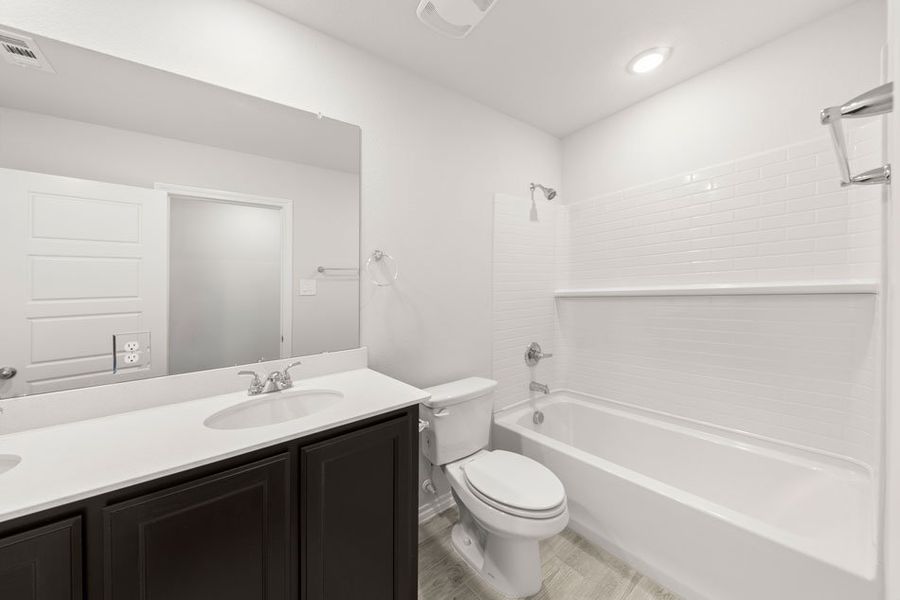 Front exterior of a new home in Keeneland, Aubrey, TX, highlighting curb appeal (Image 25).