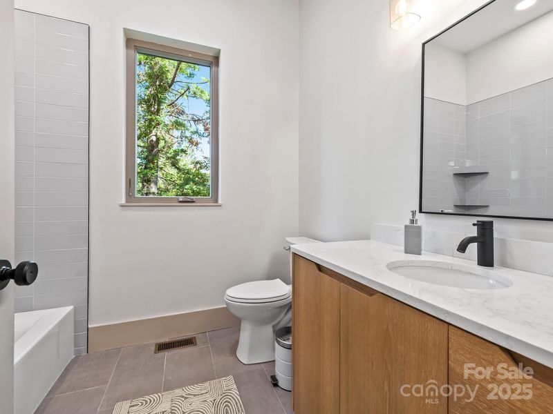 2nd bath with tub and tiled surround