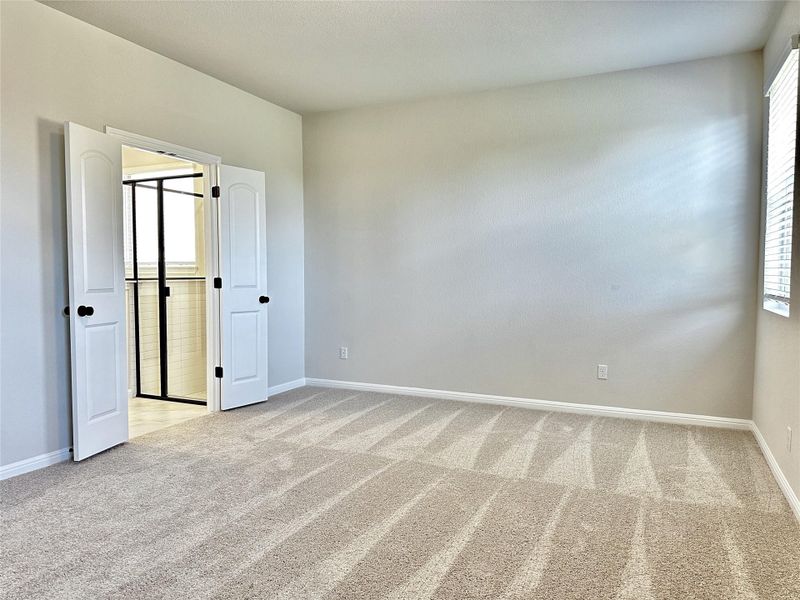 Spacious, unfurnished interior of a new home in The Colony 50s, Bastrop (Image 12).