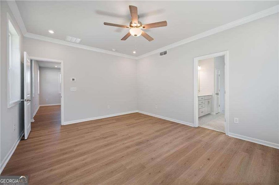 Spacious, unfurnished interior of a new home in The Paddocks at Doc Hughes, Buford (Image 39).