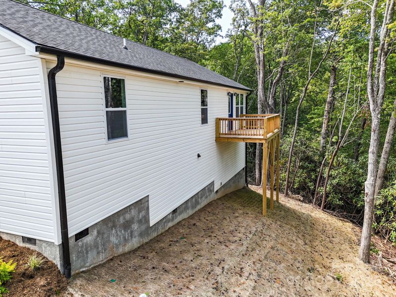 Front exterior of a new home in , Etowah, NC, highlighting curb appeal (Image 18). Front exterior of a new home in , Etowah, NC, highlighting curb appeal (Image 18).