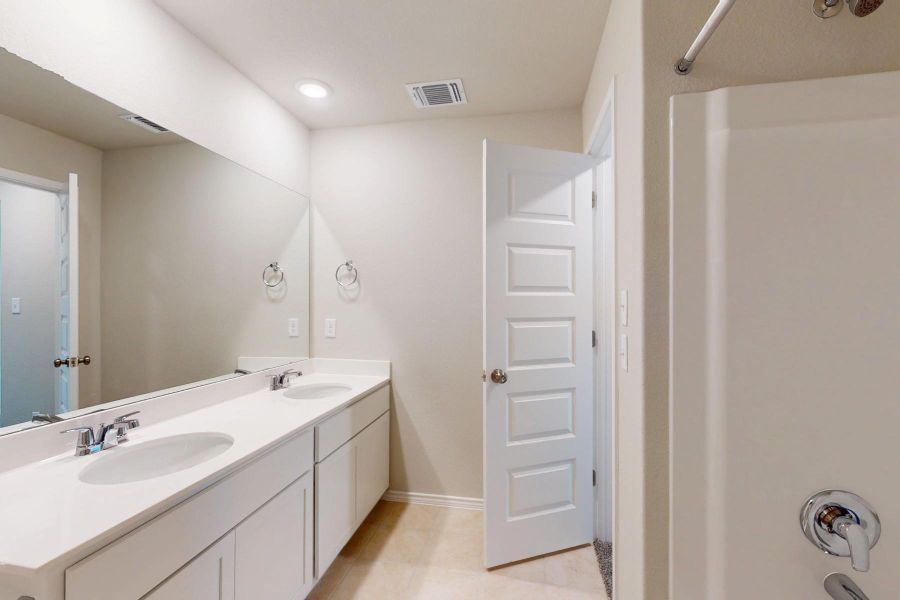 Furnished interior view inside a new home in Carillon, Manor (Image 12).