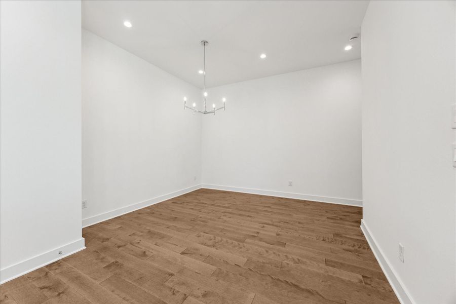 Dining Room * Designer Chandelier * Recessed Lighting * Hardwood Floors. Dining Room * Designer Chandelier * Recessed Lighting * Hardwood Floors.