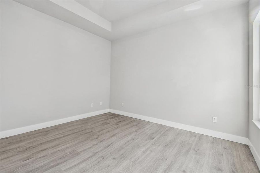 Spacious, unfurnished interior of a new home in Emerald Landing at Waterside at Lakewood Ranch – Cottage Series, Sarasota (Image 37). Spacious, unfurnished interior of a new home in Emerald Landing at Waterside at Lakewood Ranch – Cottage Series, Sarasota (Image 37).