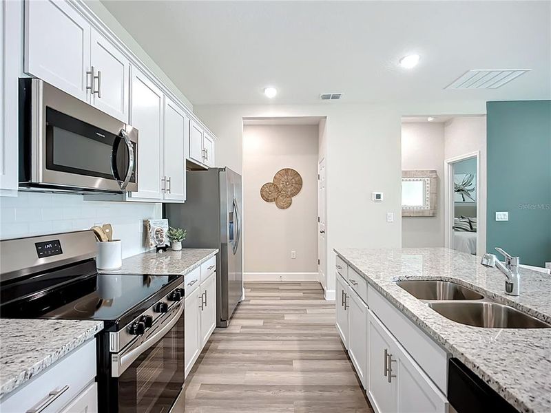 Furnished interior view inside a new home in , North Port (Image 40).