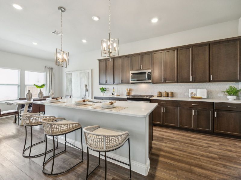 Furnished interior view inside a new home in Lakehaven - Premier Series, Farmersville (Image 4). Furnished interior view inside a new home in Lakehaven - Premier Series, Farmersville (Image 4).