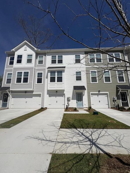 Front exterior of a new home in , Hanahan, SC, highlighting curb appeal (Image 14).