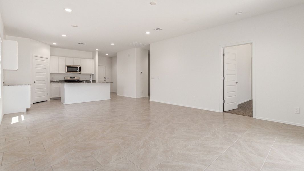 Representative unfurnished interior of a home built from the Elgin by D.R. Horton in Sycamore Vista, Vail (Image 12). Representative unfurnished interior of a home built from the Elgin by D.R. Horton in Sycamore Vista, Vail (Image 12).