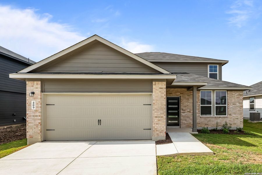 Front exterior of a new home in Hannah Heights, Seguin, TX, highlighting curb appeal (Image 29). Front exterior of a new home in Hannah Heights, Seguin, TX, highlighting curb appeal (Image 29).