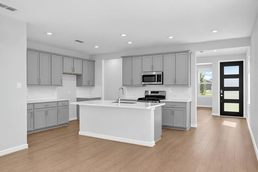 Furnished interior view inside a new home in Avalon at Cypress, Cypress (Image 5).