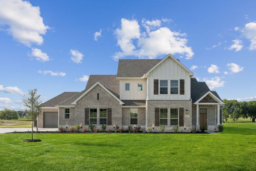 Front exterior of a new home in Lakeway Estates, Waxahachie, TX, highlighting curb appeal (Image 1). Front exterior of a new home in Lakeway Estates, Waxahachie, TX, highlighting curb appeal (Image 1).