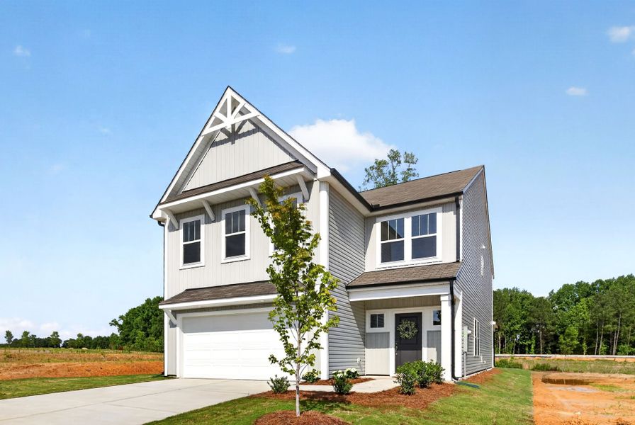 Front exterior of a new home in White Oak Creek Crossing, Angier, NC, highlighting curb appeal (Image 2).