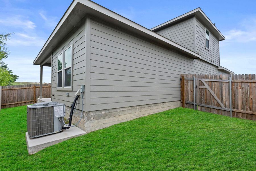 Exterior details and patio area of a home in Bollinger, Maxwell (Image 18).