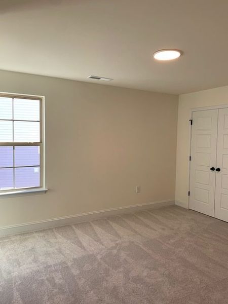 Spacious, unfurnished interior of a new home in Royal Pines, Trinity (Image 31).