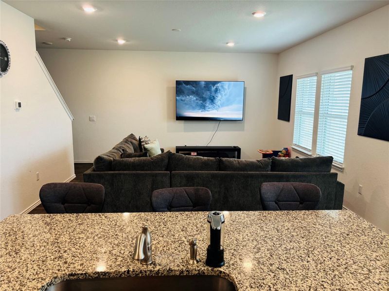 Granite-style countertop overlooking the Living Room. Granite-style countertop overlooking the Living Room.