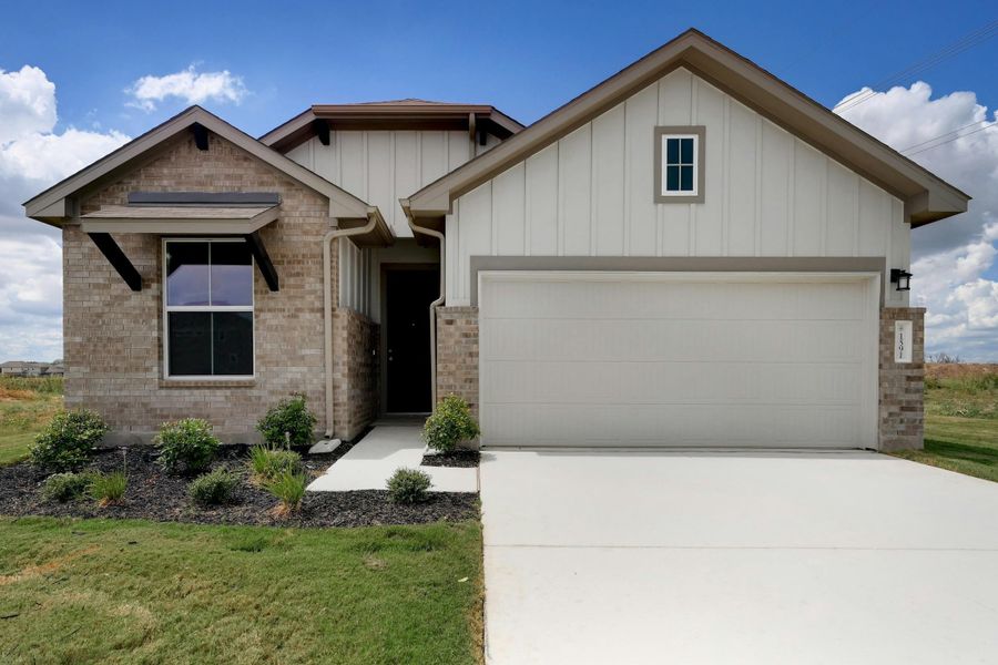 Front exterior of a new home in Willowbrook, New Braunfels, TX, highlighting curb appeal (Image 1). Front exterior of a new home in Willowbrook, New Braunfels, TX, highlighting curb appeal (Image 1).