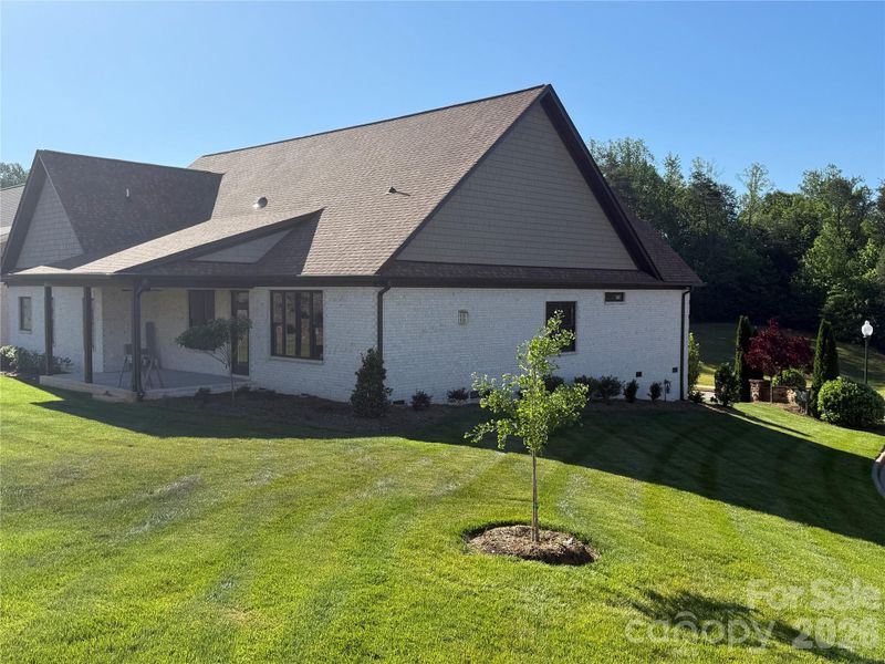 Exterior details and patio area of a home in , Conover (Image 3).