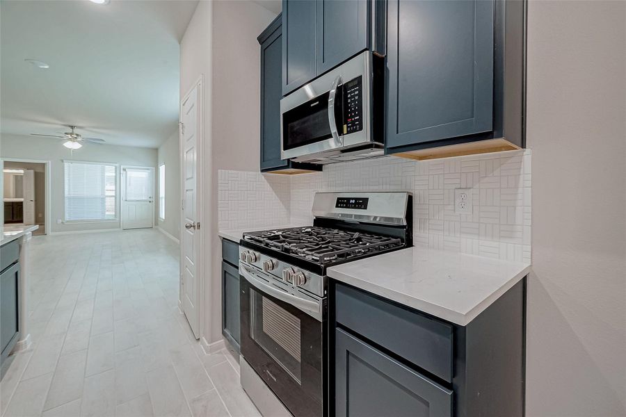 Furnished interior view inside a new home in Woodland Lakes, Huffman (Image 5).