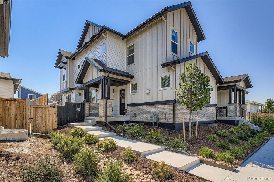 Front exterior of a new home in , Denver, CO, highlighting curb appeal (Image 2).