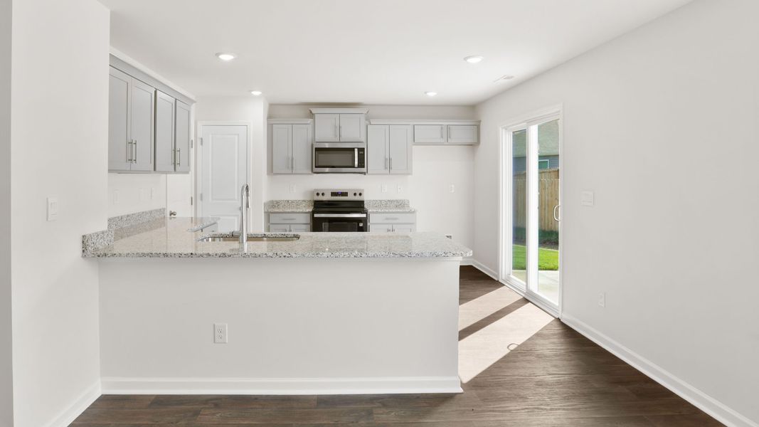 Furnished interior view inside a new home in Wildbrook Village, Waynesville (Image 6).