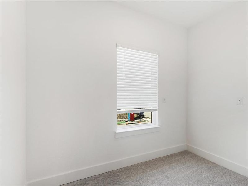 Spacious, unfurnished interior of a new home in Royal Court, Little Elm (Image 14).