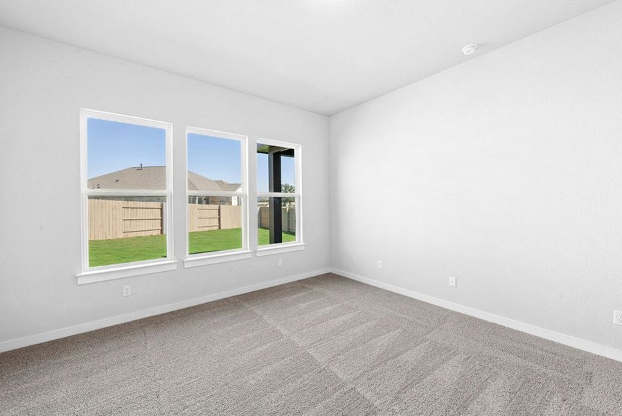 Spacious, unfurnished interior of a new home in The Colony, Bastrop (Image 29).