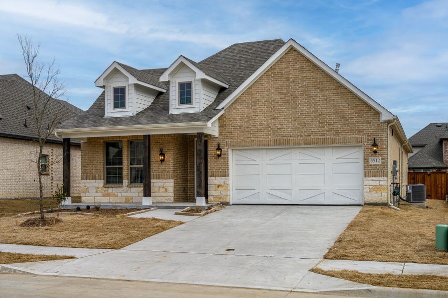 Representative exterior photo of a completed home built from the Ashlar by Stonehollow Homes in Heritage Grove, Blue Ridge, TX (Image 14).