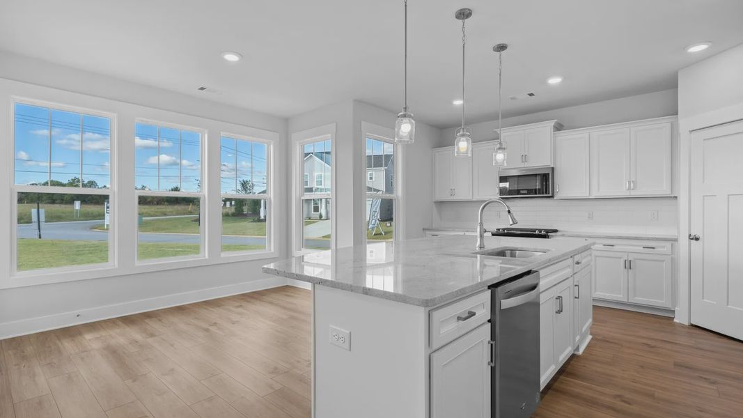 2 story single family home, all white, kitchen