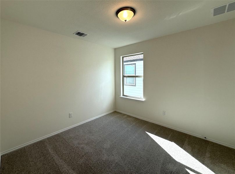 Spacious, unfurnished interior of a new home in River Bluff, Leander (Image 28).