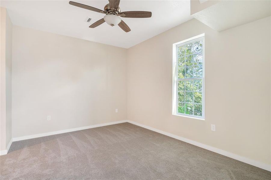 The fourth bedroom can be used as an office or as a bedroom. This flex space has plenty of room and lots of light!