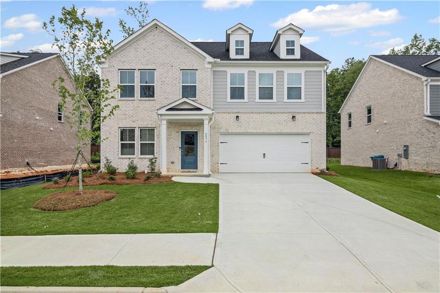 Front exterior of a new home in Briar Creek, Atlanta, GA, highlighting curb appeal (Image 9). Front exterior of a new home in Briar Creek, Atlanta, GA, highlighting curb appeal (Image 9).