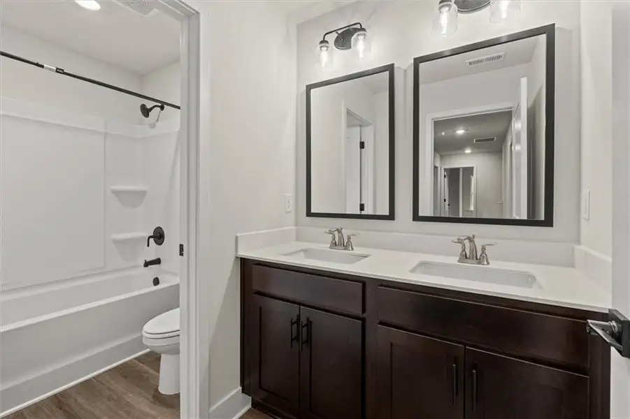 Furnished interior view inside a new home in Canterbury Villas, Carrollton (Image 6).