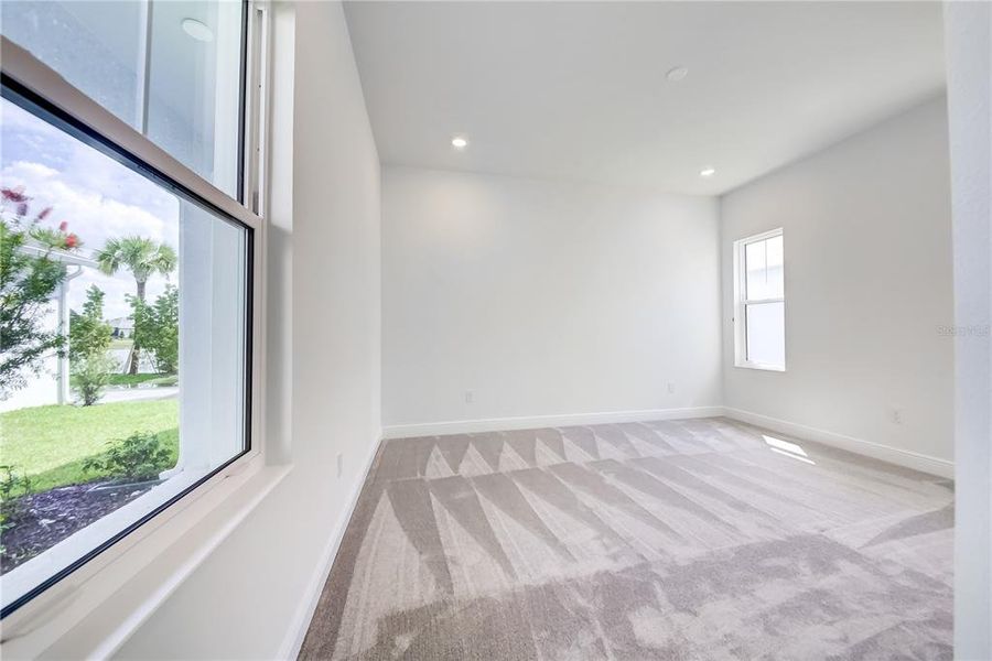 Spacious, unfurnished interior of a new home in Bungalow Walk at Lakewood Ranch, Lakewood Ranch (Image 32).