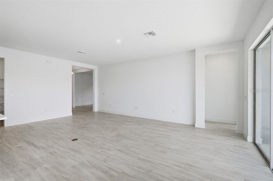 Spacious, unfurnished interior of a new home in Esplanade at Westview, Kissimmee (Image 19).