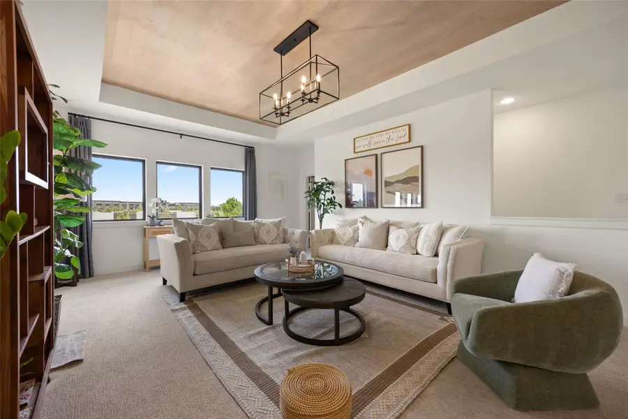 Furnished interior view inside a new home in Bridgeland, Cypress (Image 13).