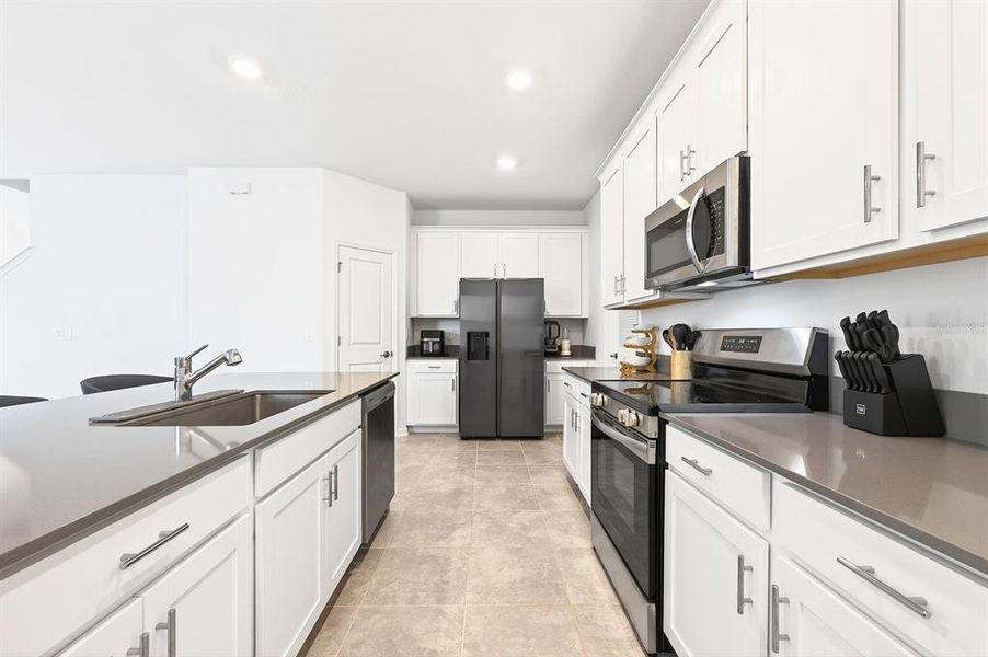 Furnished interior view inside a new home in Tohoqua, Kissimmee (Image 6).