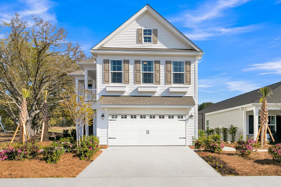 Front exterior of a new home in Six Oaks, Summerville, SC, highlighting curb appeal (Image 1).