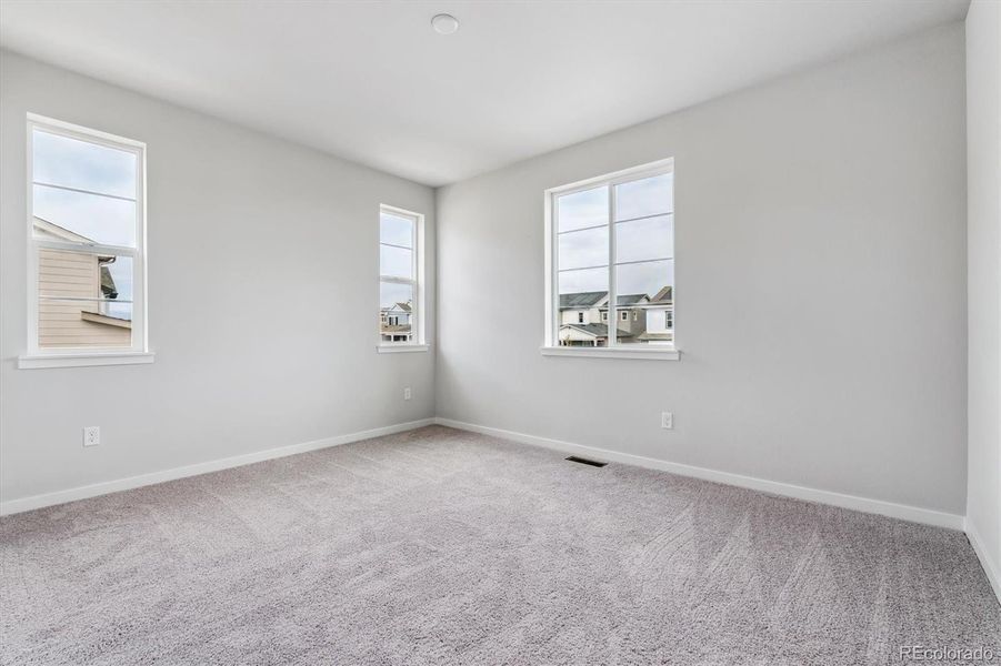 Spacious, unfurnished interior of a new home in Floret Collection at Parkdale Commons, Lafayette (Image 14).