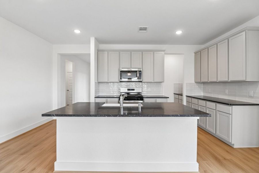 Furnished interior view inside a new home in Trinity Grove, Spring (Image 7).