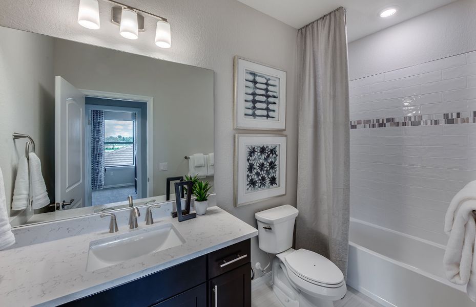 Representative furnished interior of a home built from the Banyan by Pulte Homes in Coral Edge, Margate (Image 14).