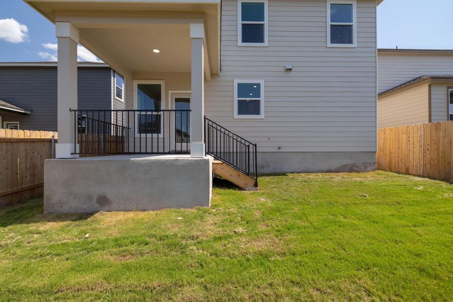 Front exterior of a new home in Sonterra - Cool Water, Jarrell, TX, highlighting curb appeal (Image 23). Front exterior of a new home in Sonterra - Cool Water, Jarrell, TX, highlighting curb appeal (Image 23).