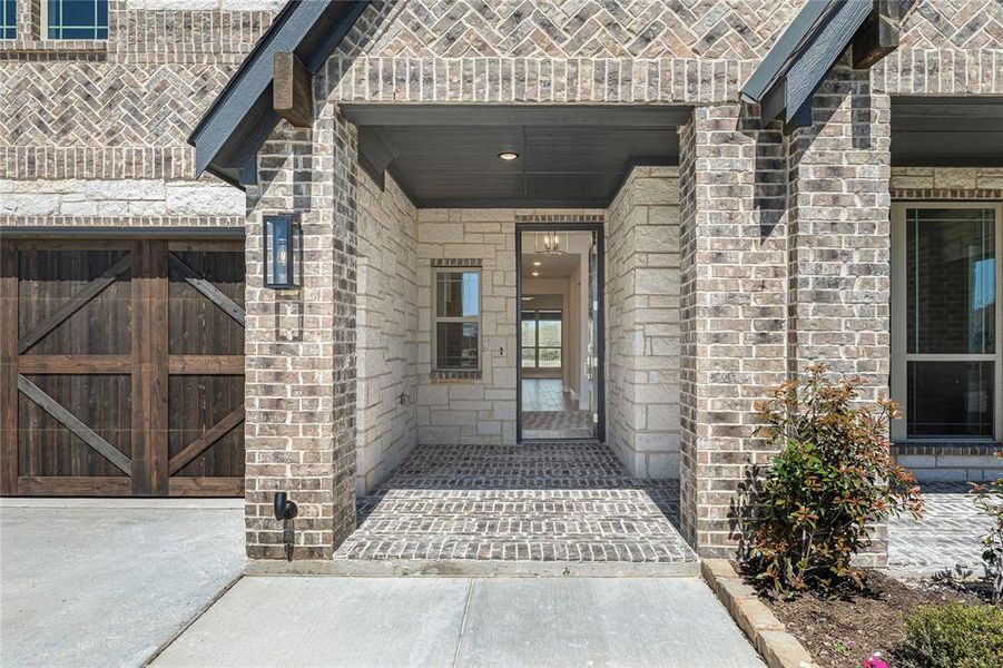 Exterior details and patio area of a home in Sunrise at Garden Valley, Waxahachie (Image 27). Exterior details and patio area of a home in Sunrise at Garden Valley, Waxahachie (Image 27).