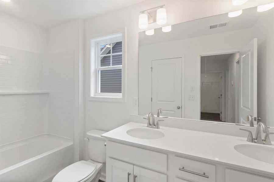 Furnished interior view inside a new home in Brownstone Park, Easley (Image 9).