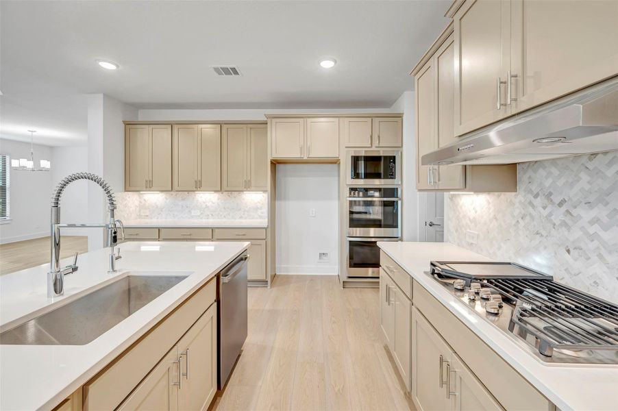 Furnished interior view inside a new home in The Oaks on 6th Street, Magnolia (Image 11).