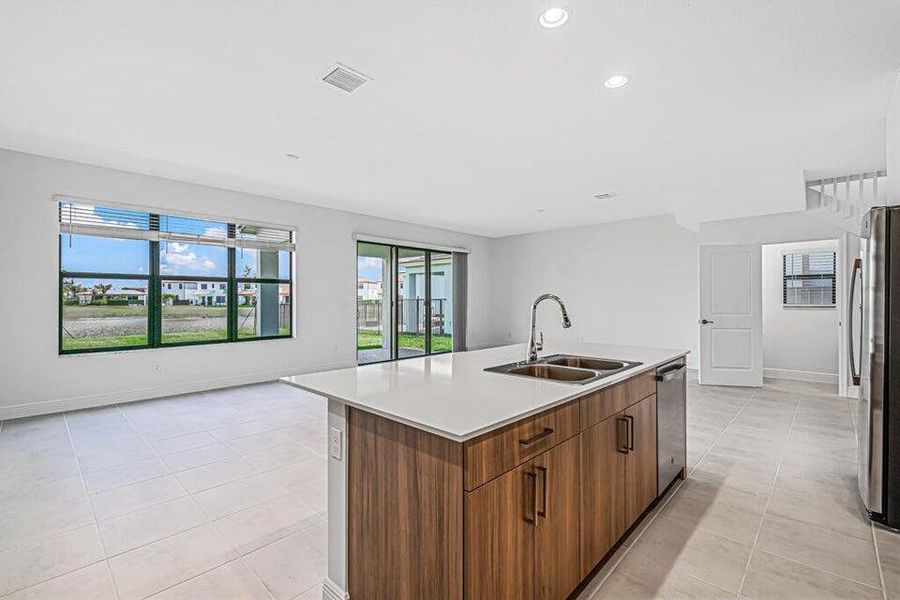 Quartz island overlooks living area