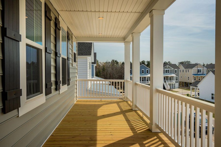 Exterior details and patio area of a home in Heron's Walk at Summers Corner, Summerville (Image 28).