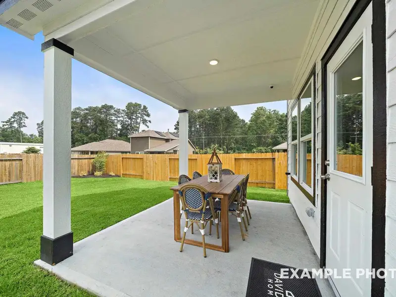 Exterior details and patio area of a home in Caney Creek Place, Conroe (Image 2). Exterior details and patio area of a home in Caney Creek Place, Conroe (Image 2).