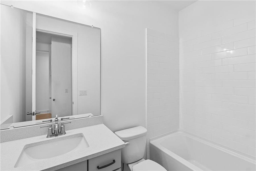 Furnished interior view inside a new home in Maple Grove at Towne Lake, Woodstock (Image 6).